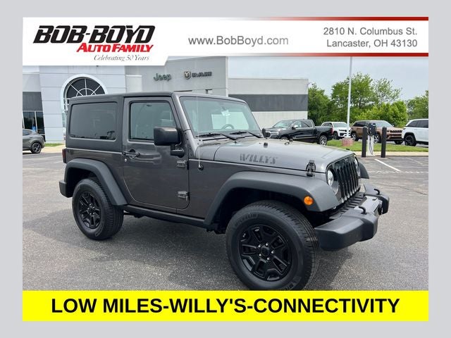 2014 Jeep Wrangler Sport in Granite Crystal Metallic Clearcoat — front three-quarter view