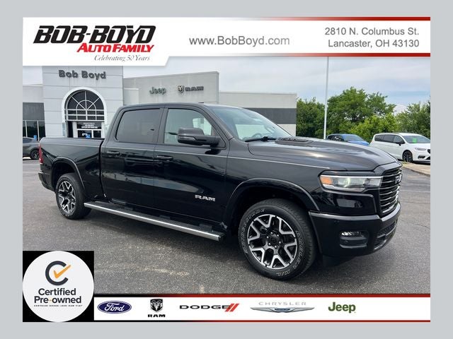 2025 RAM 1500 Laramie in Diamond Black Crystal Pearlcoat — front three-quarter view