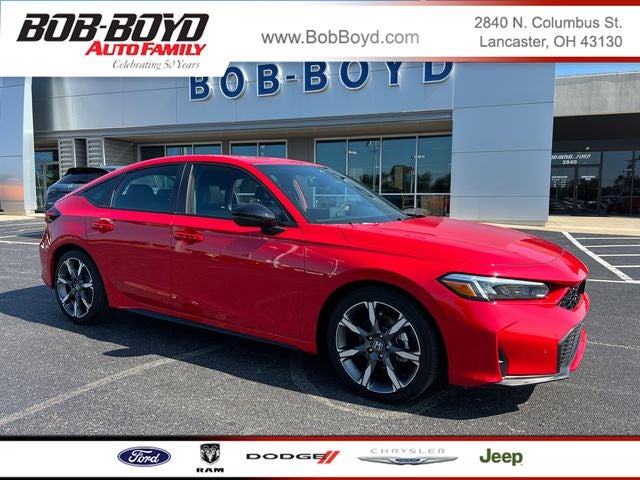 2026 Honda Civic Hybrid Sport Touring in Rallye Red — front three-quarter view