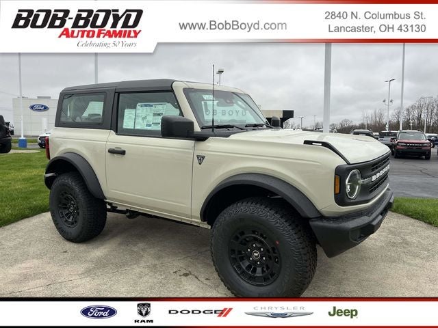 2026 Ford Bronco Base in Desert Sand — front three-quarter view