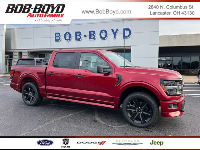 2026 Ford F-150 STX in Ruby Red Met Tinted Cc — front three-quarter view