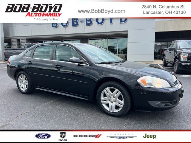 2011 Chevrolet Impala LT in Black — front three-quarter view