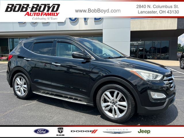 2016 Hyundai Santa Fe Sport 2.0T in Twilight Black — front three-quarter view