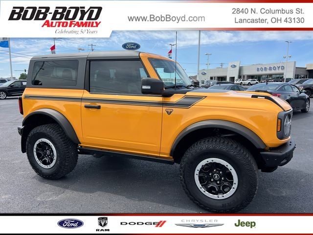 2022 Ford Bronco Badlands in Cyber Orange Metallic Tricoat — front three-quarter view