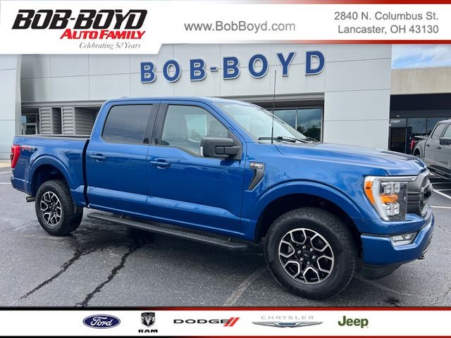 2023 Ford F-150 XLT in Atlas Blue Metallic — front three-quarter view