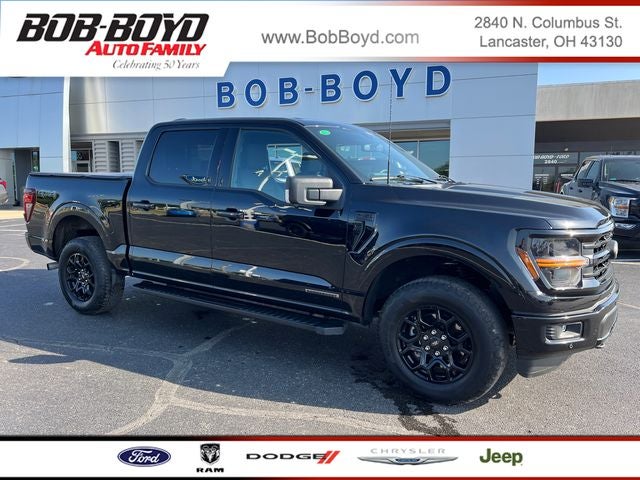 2025 Ford F-150 XLT in Agate Black Metallic — front three-quarter view