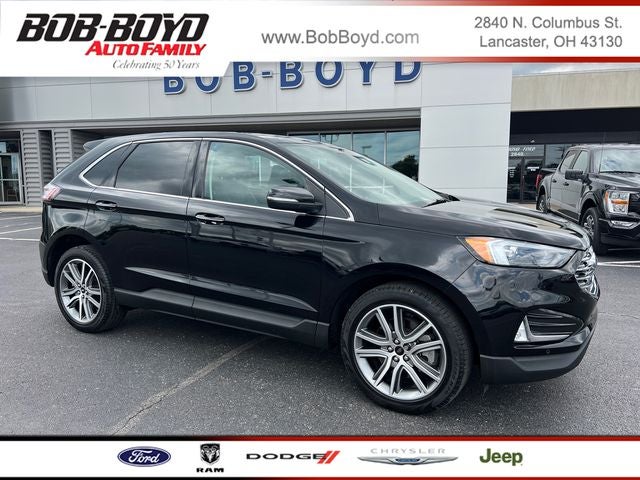 2024 Ford Edge Titanium in Agate Black Metallic — front three-quarter view